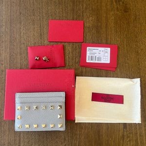 Valentino rockstud card case with original box, authentication card, extra studs